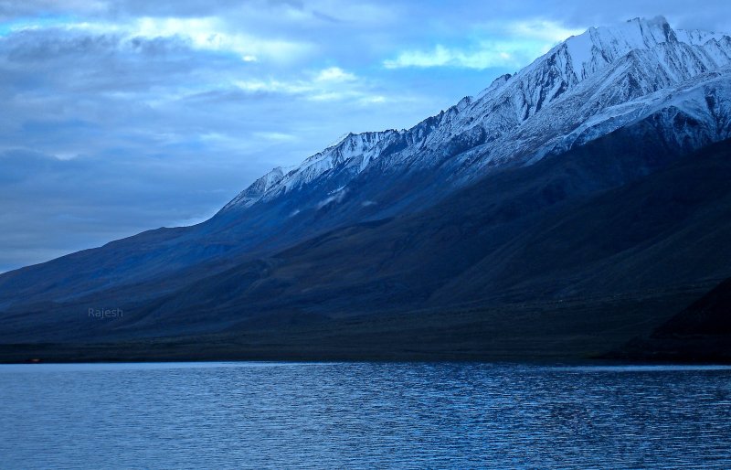 Nice outdoor photography.  Giant lake in the Himalayas.