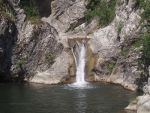 Waterfall near Medven, Bulgaria.  Life jackets, swimming shorts.