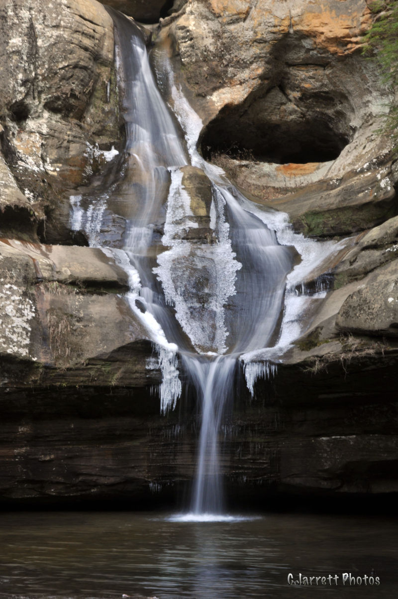 Fascinating waterfall.  Gorgeous photograph.  