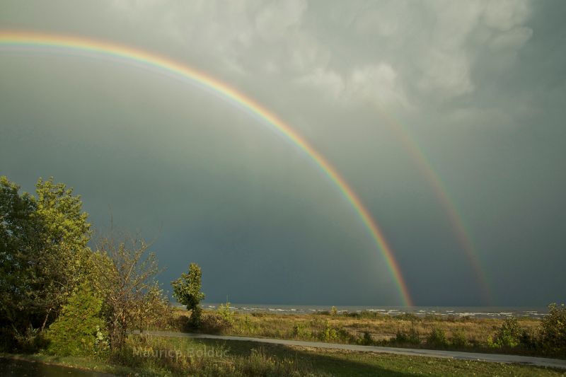 Twin rainbows at the top of Lake Michigan
