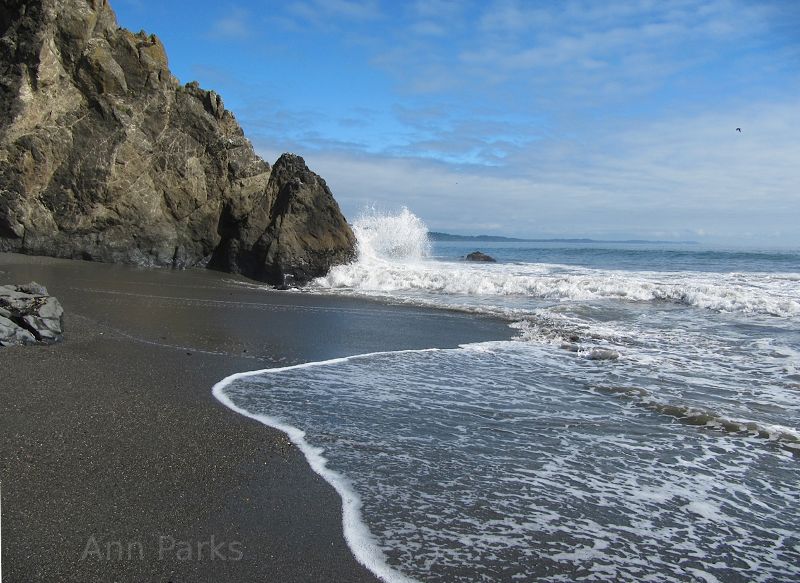 Crashing waves on a rocky beach.