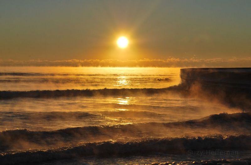 Sunrise and fog over Narragansett Bay.