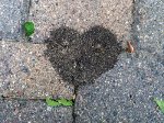 Gravel in a heart shaped pile.