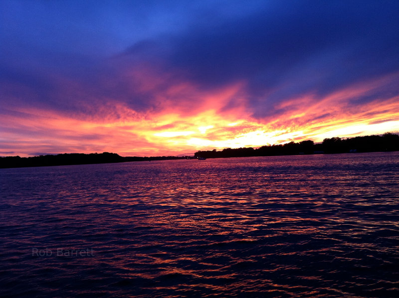 Pink sky over lake in Minnesota