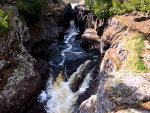 Creek cutting a channel through rock