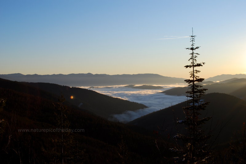 Morning Light On the Clouds below