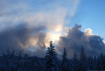 Sun through pretty winter clouds