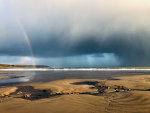 Rainbow on the beach in South Wales, UK