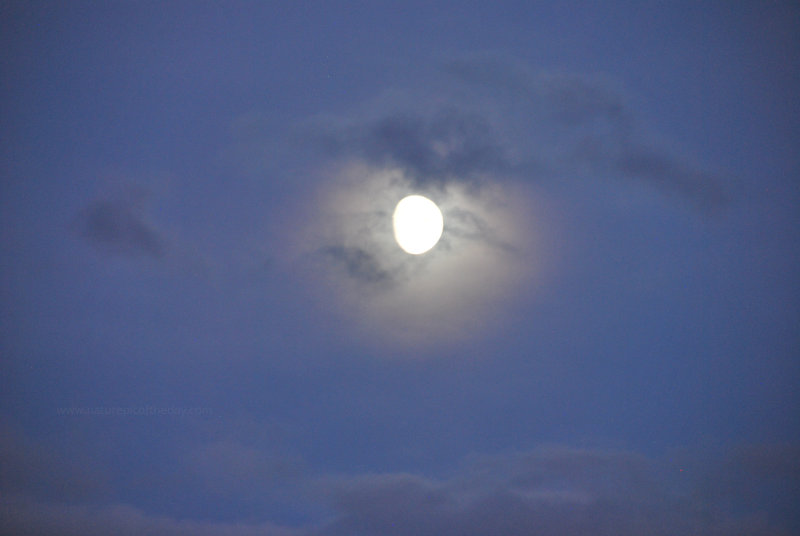 It is, indeed, a shot of the moon, and some clouds.